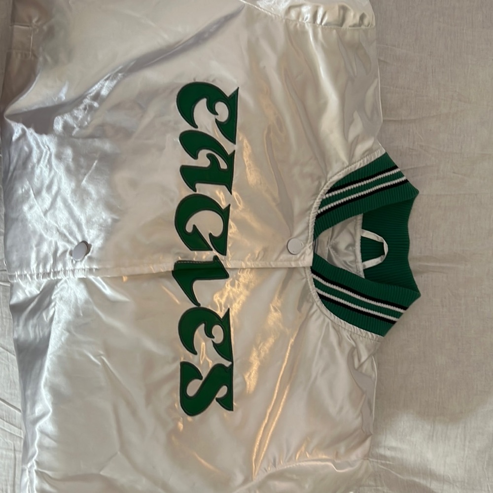 Green, black and White. Sure to turn heads while wearing this beauty